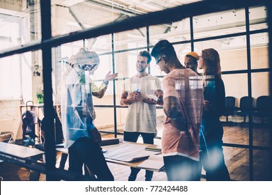 Happy group of young architects collaborating on common project working in friendly atmosphere, multiracial team having brainstorming session satisfied with creative solutions and productive job - Shutterstock ID 772424488
