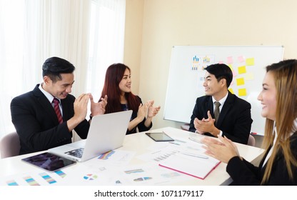 Happy Group Of Young Asian Businesspeople Clapping In Office.people Joining For Cooperation And Relationship Success Business, Win In Everything,Applause Appreciation Award Cheerful Meeting Concept