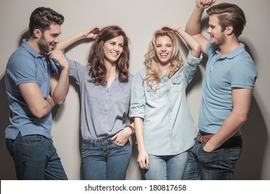 happy group of young casual fashion people laughing together 