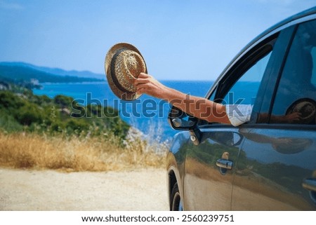 happy guy in auto sea background