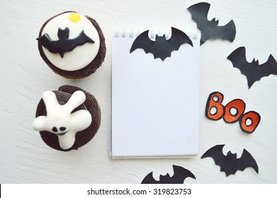 Happy Halloween Cupcakes.Halloween Cookies.recipe Book.Preparation For Sweet Cupcakes With Sweet Cream