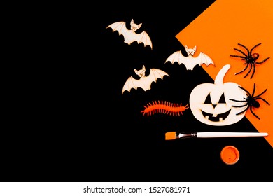 Happy Halloween Diy Pumpkin, Spiders And Vampire Bats Cut Outs On Black Background In Flat Lay With Paint And Brush. Class Or School Activities For Children And Kids Cocncept With Copy Space