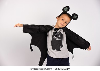 Happy Halloween. Flying bat boy. Boo carnival costume . Cute scary spooky character. Smiling face with open hands. White isolated background. - Powered by Shutterstock