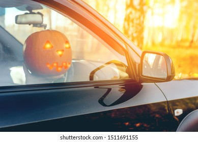 Happy Halloween! Jack O'lantern Driving A Car. Tradition Concept.	