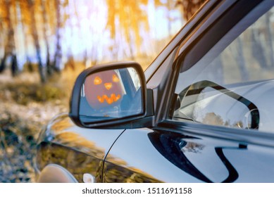 Happy Halloween! Jack O'lantern Driving A Car. Tradition Concept.	