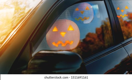 Happy Halloween! Jack O'lantern Driving A Car. Tradition Concept.	