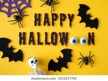 Happy Halloween letters with spiders, bats, skeleton, eyes, spider web. Halloween party invitation design. - Powered by Shutterstock