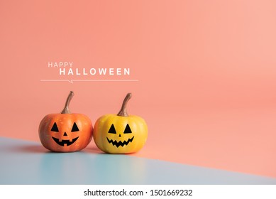 Happy Halloween Message, Pumpkin On Pastel Paper Background.