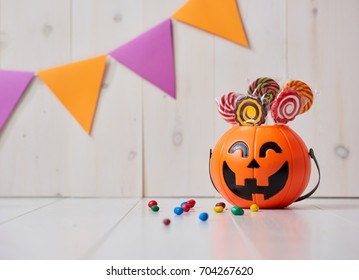 Happy Halloween! Pumpkin With Candy In The Home. 