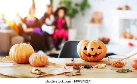 happy Halloween! the pumpkin Jack lantern with carved smile for family holiday at  home