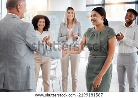 Happy handshake, by man and woman in office, for promotion in business, team gives applause. Meeting with diversity in people celebrate workers progress to new role in corporate marketing job.