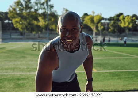 Similar – Black man practicing yoga in urban background.