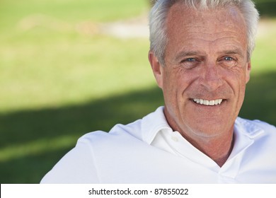 Happy And Healthy Senior Man Sitting Outside Smiling And Happy