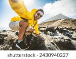 Happy hiker having fun hiking mountains - Active young man taking selfie pic with smart mobile phone device outdoors - Action cam, extreme sports and summertime holidays concept