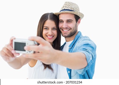 Happy Hipster Couple Taking A Selfie On White Background