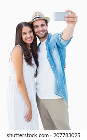 Happy Hipster Couple Taking A Selfie On White Background