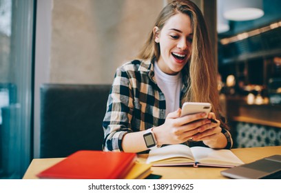 Happy Hipster Girl Feeling Shocked From Received Email With Information About University Session Connected To 4g Wireless On Mobile Phone, Surprised Female Student Messaging With Scholar Via App