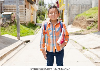 Happy Hispanic Boy Ready To Go To School With His Backpack And Notebooks - Latin Boy On His Way To School