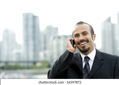 Happy Hispanic Business Man On Phone