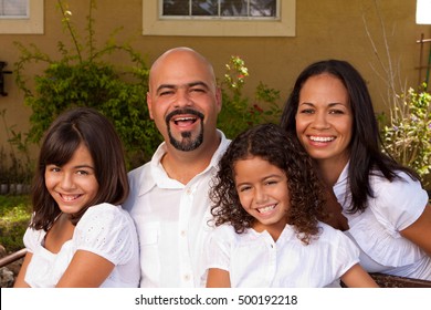 Happy Hispanic Family.