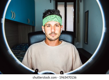 Happy Hispanic Millennial Man Making Video Call At Home - Young Guy Taking A Selfie At Camera Indoor - People, Vlog, Influencers And Dating Online Concept