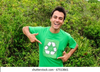 Happy hispanic volunteer wearing a green recycling shirt - Powered by Shutterstock