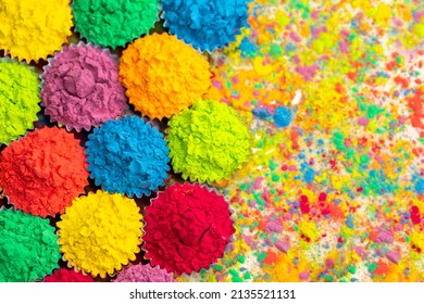 Happy Holi. A colorful festival of colored paints made from powder and dust. Colorful holi powder background. Holiday of bright colors Indian tradition. - Shutterstock ID 2135521131