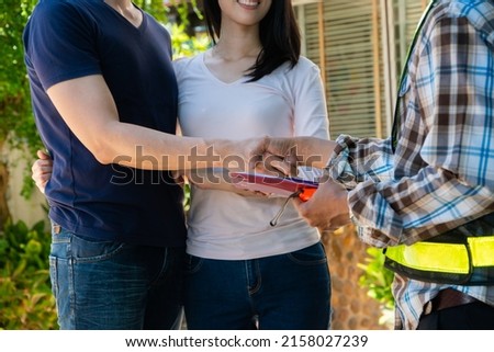 Happy homeowner stand in front of contractor and shake hand, handyman holding clipboard and after checking details before renovations home, house improvement interior, Interior design