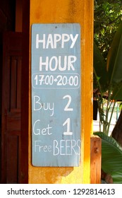 Happy Hour And Free Beer Text On Sign Board, Outdoor Street Cafe Bar In Hoian (Hoi An), Vietnam, Asia