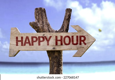 Happy Hour wooden sign with a beach on background