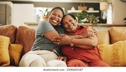 Happy, hug and portrait of black woman with senior mother on sofa in home for womens day celebration together. Smile, bonding and African female person embracing mom for connection in living room. - Powered by Shutterstock