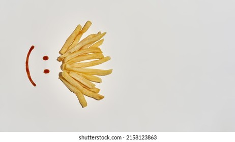 Happy Human Face Smile From Sauce And French Fries Isolated On White Background. Unhealthy Eating And Fast Food. Fresh Cooked Delicious And Appetizing Snack For Leisure. Studio Shoot. Copy Space