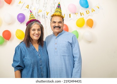 Happy Indian Asian Old Couple Celebrate Birthday. Elderly Retired People Doing Party Together.