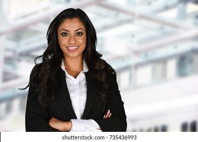 Happy Indian Businesswoman dressed in nice clothes