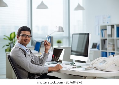 Happy Indian Entrepreneur In His Office