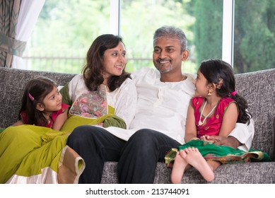 Happy Indian Family Enjoying Quality Time At Home Indoor 