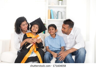 Happy Indian Family Graduation, Education Concept Photo 
