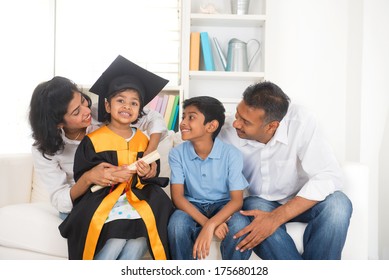 Happy Indian Family Graduation, Education Concept Photo 