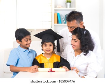 Happy Indian Family Graduation, Education Concept Photo