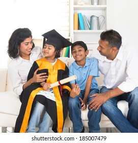 Happy Indian Family Graduation, Education Concept Photo