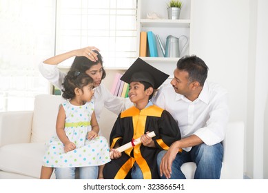 Happy Indian Family Graduation, Education Concept Photo

