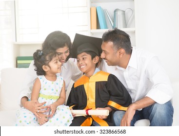 Happy Indian Family Graduation, Education Concept Photo

