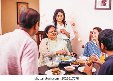 Happy Indian Family Having A Festive Diwali Dinner Together