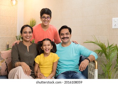 Happy Indian Family At Home
