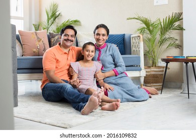 Happy Indian Family At Home