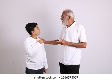 Happy Indian Grandfather And Grandson Spending Quality Time