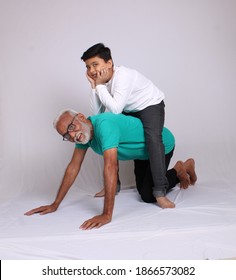 Happy Indian Grandfather And Grandson Spending Quality Time