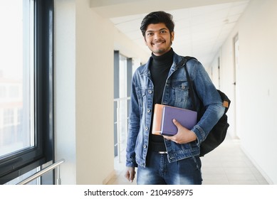 Happy Indian Male Student At The University