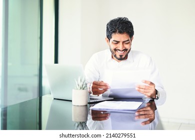 Happy Indian Man Opening An Envelope With Letter
