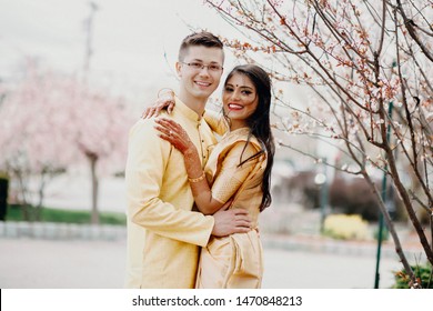 Happy Indian Newlyweds Embrace And Rejoice Each Other